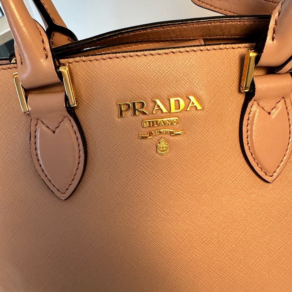 Authentic crossbody and double handle tote from Prada in a pinkish beige. - Picture 9 of 15